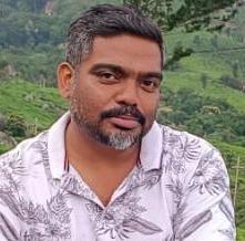 ജീവനക്കാരന്റെ ഫോട്ടോ