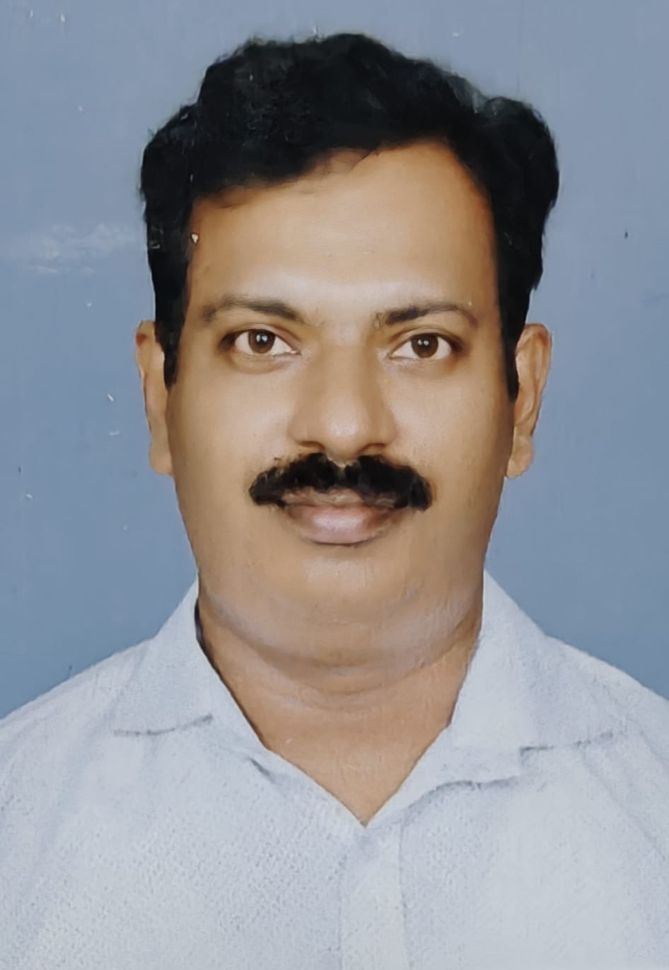 ജീവനക്കാരന്റെ ഫോട്ടോ