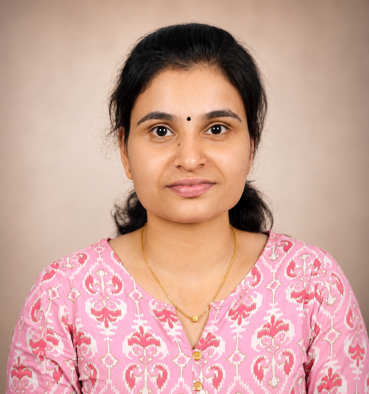 ANJU M