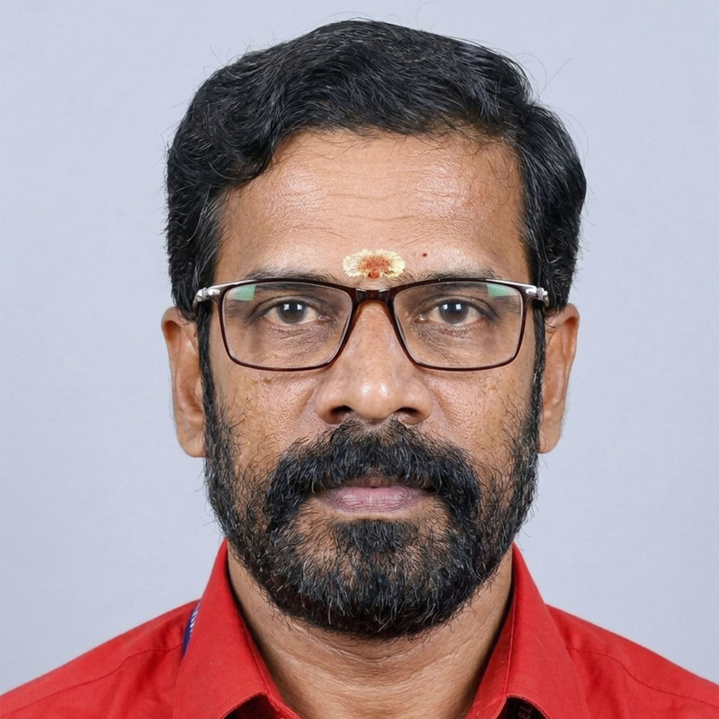 T GIRISH